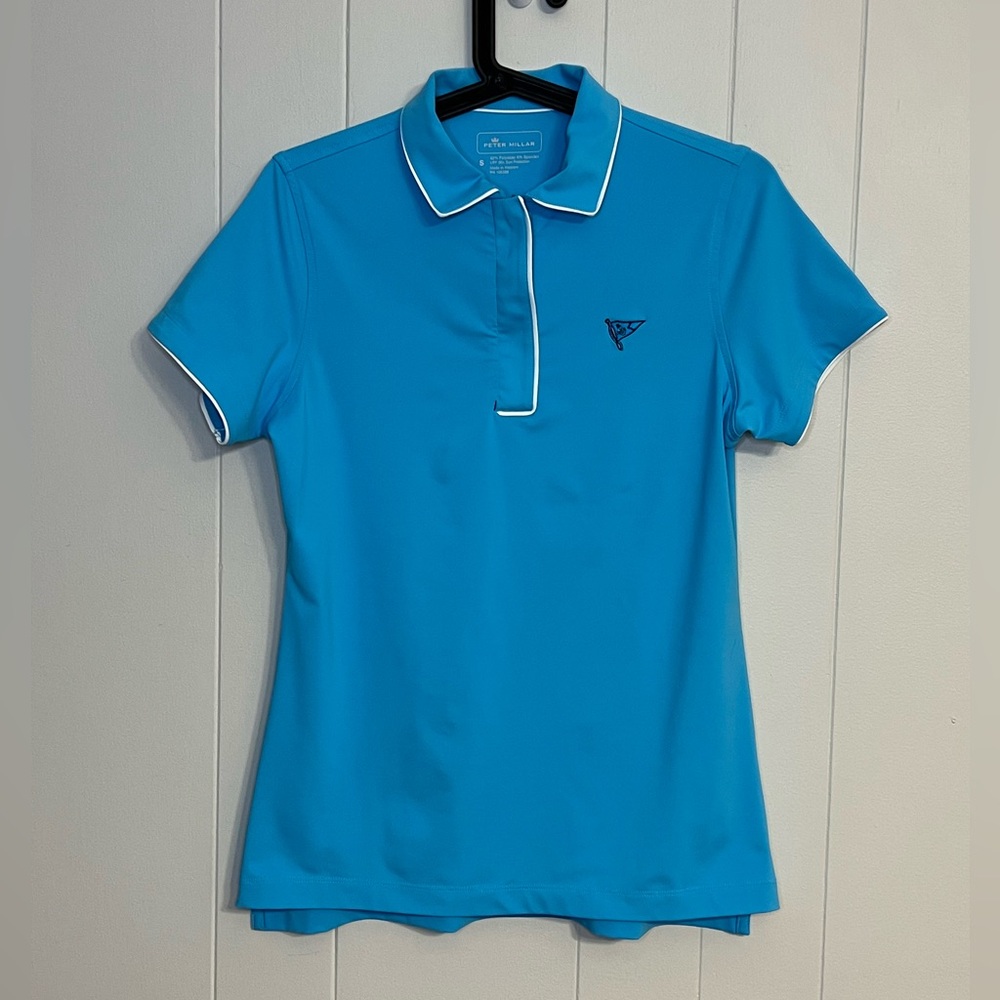 Peter Millar performance polo in a bright‎ blue with white piping Size S